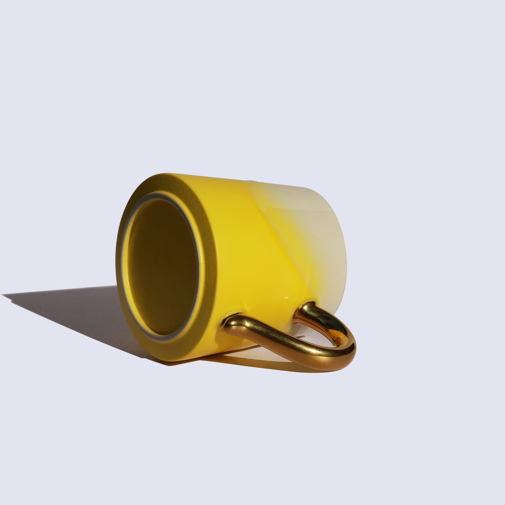 
                  
                    Yellow Coffee Mug with Gold Handle
                  
                