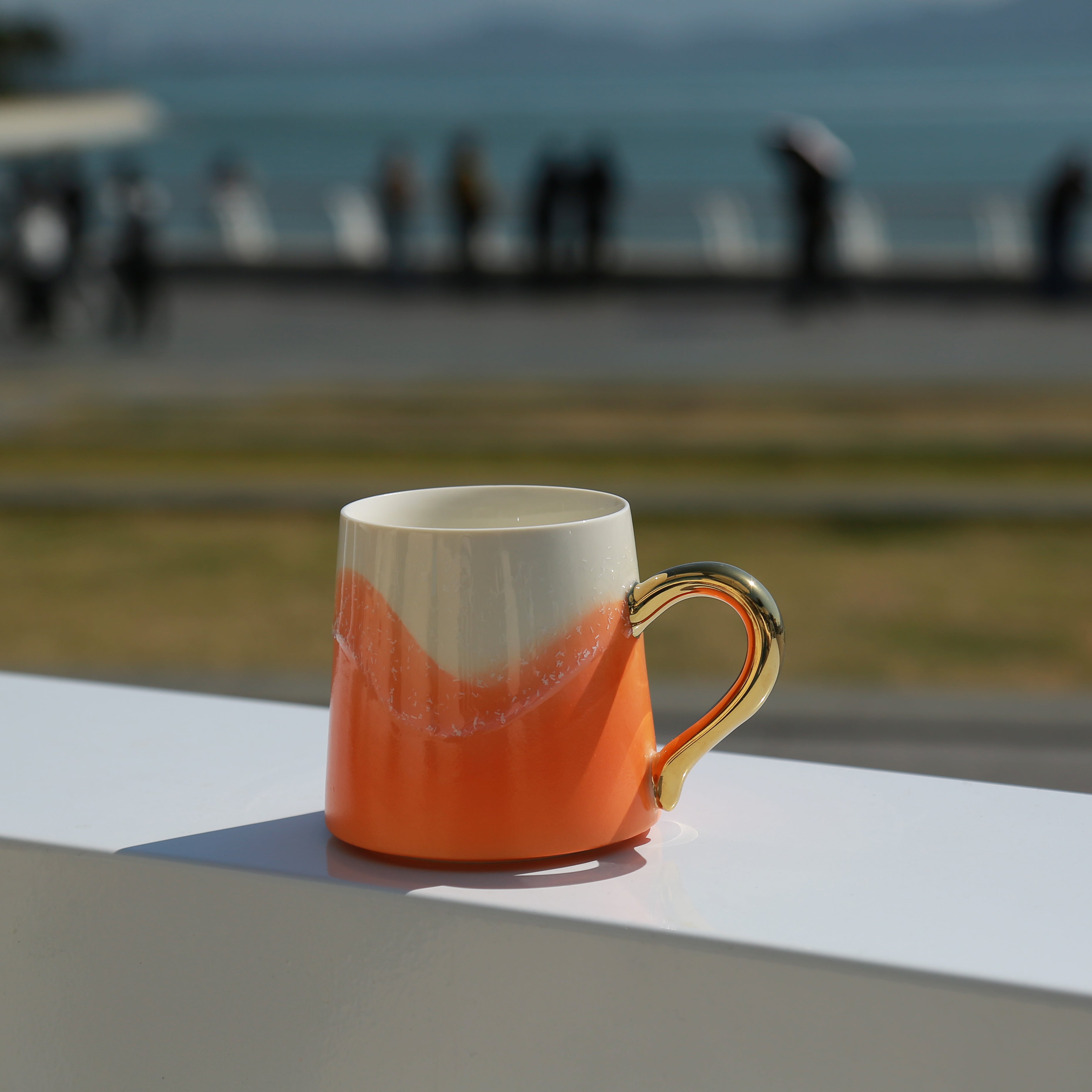 Orange Artisan Coffee Mug with Gold Handle | Cheralle