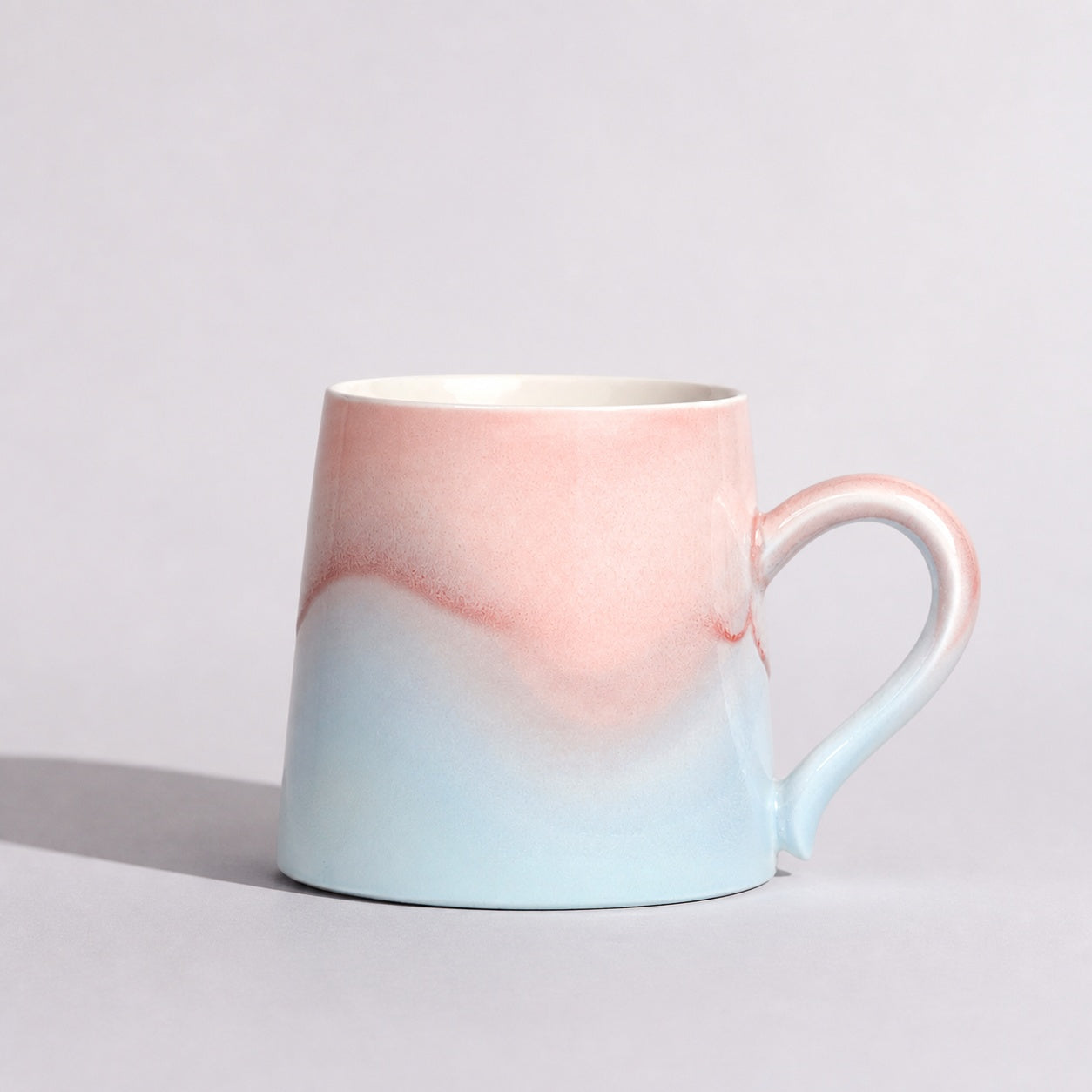 Cheralle Tide Collection Mist Blue mug with a soft blush upper glaze, front view
